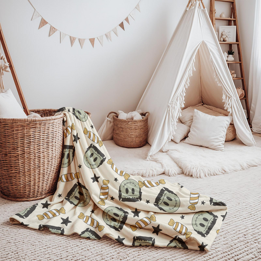 Children's playroom with a teepee, baskets, and a patterned blanket.